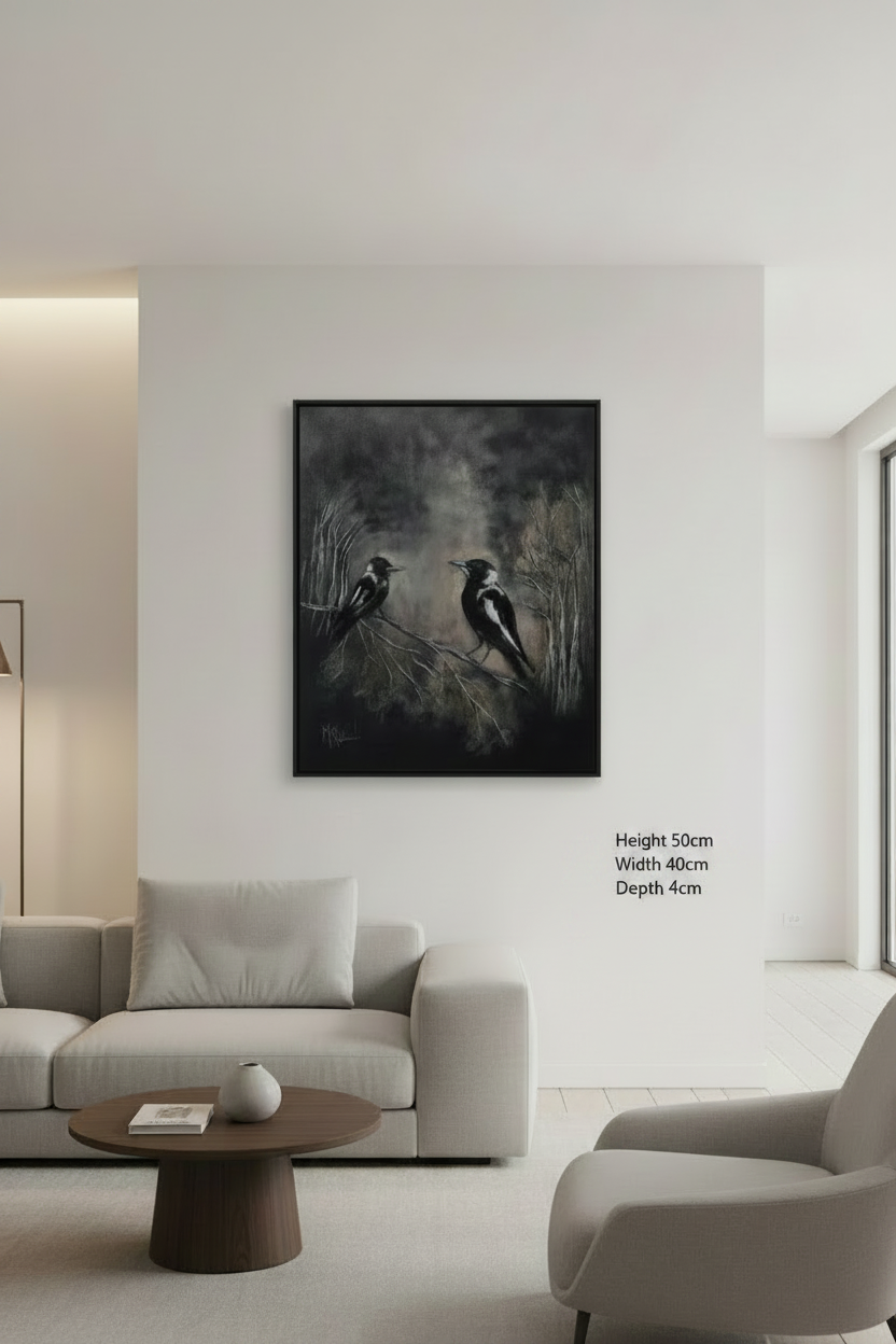 A black and white ca depicting two birds perched on branches, displayed on a white wall in a modern living room setting. The print has dimensions printed on the wall next to it: Height 50cm, Width 40cm, Depth 4cm.vas painting