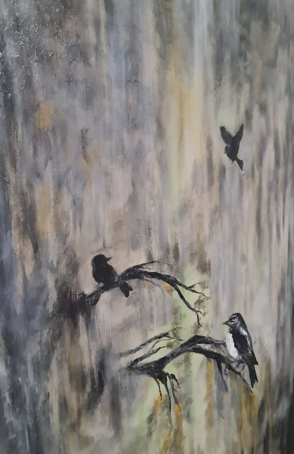 An impressionistic painting of three black birds perched on and flying near bare branches against a textured gray, beige, and muted gold background.