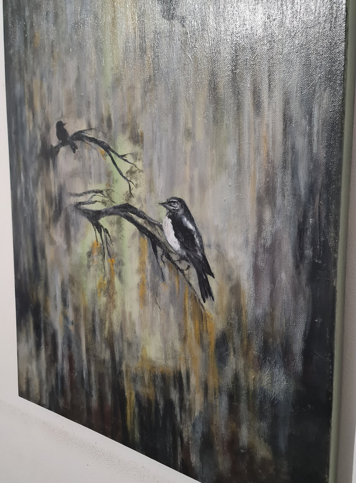 An abstract landscape painting featuring three black birds perched on branches against a textured background of gray, brown, and beige tones.